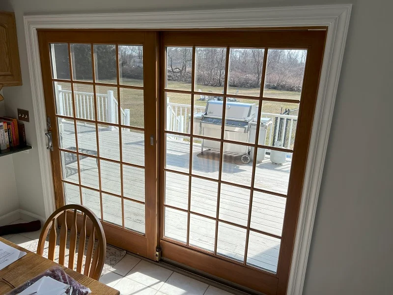 Stained interior of this Andersen door is outdated